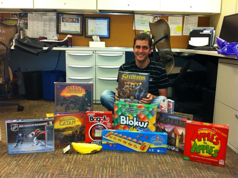 Shelter volunteer Dan Barak collected 11 new board games for us